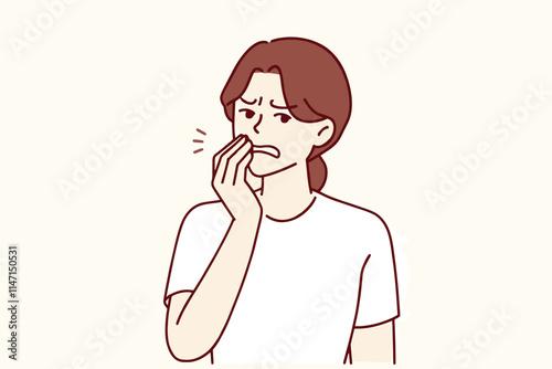 A young woman is depicted holding her jaw in discomfort seemingly experiencing a toothache.