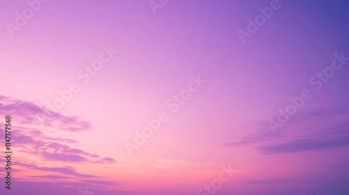 Fototapeta Naklejka Na Ścianę i Meble -  Soft pastel purple and pink sunset sky with clouds.