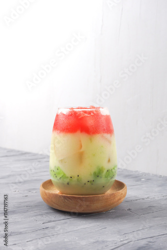 a glass of fresh drink made from kiwi, Yakult and watermelon, Ramadan drink