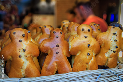 Fotografie Mannele, mannala brioche pastry at the Strasbourg Christmas Market, France