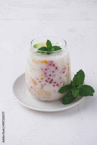 Mixed Ice (Es Campur, made from gelatin, tapioca pearls, ice, young coconut, sugar syrup, mixed fruit and coconut milk or milk. hemp during the month of Ramadan. Indonesian street food