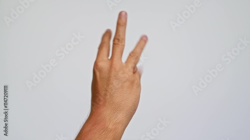 Wallpaper Mural Man showcasing hand gestures against a plain background, fingers revealing different counts on a light-colored backdrop Torontodigital.ca
