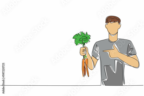 Single one line drawing man holding some carrots with the tips of the leaves still thick. Plays role in bone health. Carbohydrate. International Carrot Day. Continuous line design graphic illustration