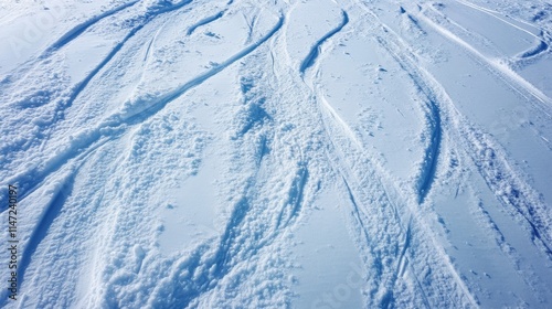 In winter, the traces of car wheels after driving on the snow