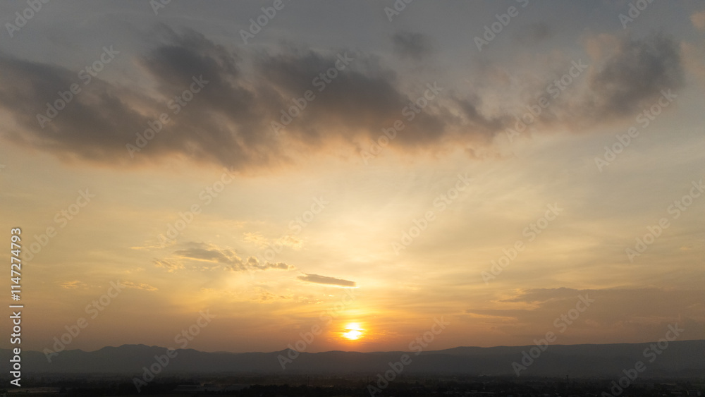 View of the sun and sky during sunset. Sunsets are a sign of a day nearly reaching it's end. View of the sun and sky during sunset. Sunsets are a sign of a day nearly reaching it's end.