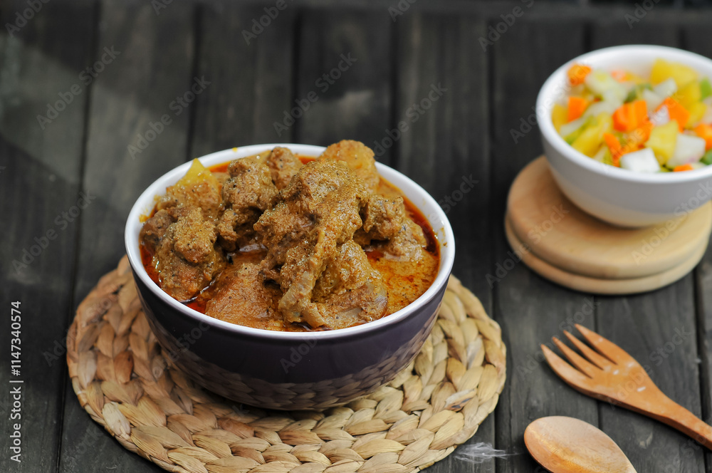 rendang; Jawi: رندڠ) is a meat-based dish produced from a long, low temperature cooking process. rendang; Jawi: رندڠ) is a meat-based dish produced from a long, low temperature cooking process.