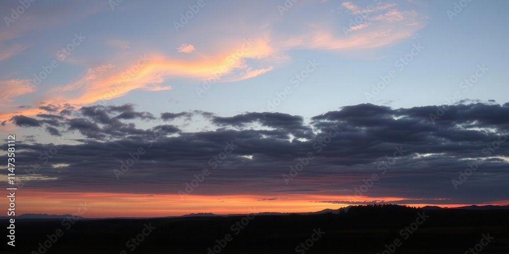 Panoramic view of a peaceful nature scene with a colorful sky and mountains in the background, tranquil, dawn, dusk Panoramic view of a peaceful nature scene with a colorful sky and mountains in the background, tranquil, dawn, dusk