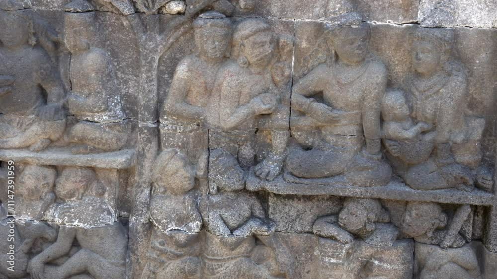 Human figures carved into Borobudur temple. Human figures carved into Borobudur temple.