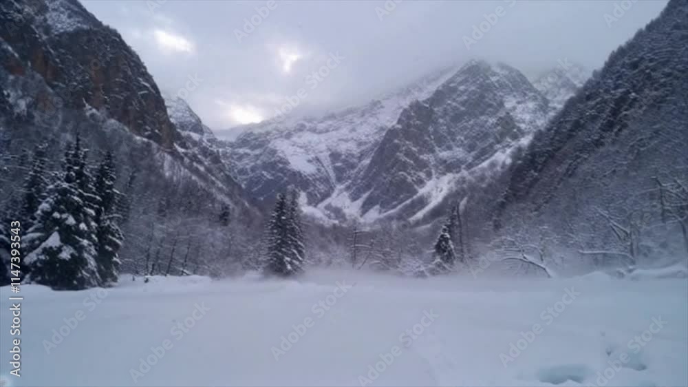 Aerial View of Snow-Capped Mountains: Stunning Winter Landscape in 4K High-Quality Video. Aerial View of Snow-Capped Mountains: Stunning Winter Landscape in 4K High-Quality Video.
