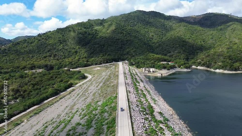 Sabaneta Dam highway, Dominican Republic. from drone flight with mountains photo