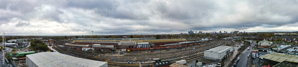 Fototapeta premium Aerial High Resolution Panoramic View of Manchester City During Autumn Season and Cloudy Day over England Great Britain. High Angle Drone's Camera Footage was Captured on October 29th, 2024