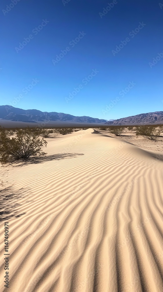 A serene desert landscape showcasing rippled sand dunes. A serene desert landscape showcasing rippled sand dunes.