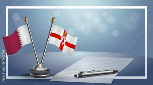 Qatar and Northern Ireland National flags on small table with bokeh background, cooperative relationship