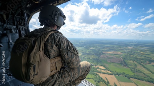 Military soldier in helicopter flying above scenic landscape aerial view nature exploration photo