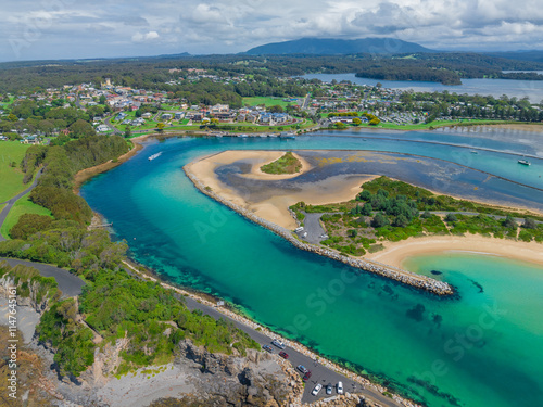 Aerial view of calm blue water in a winding coatsal inlet photo