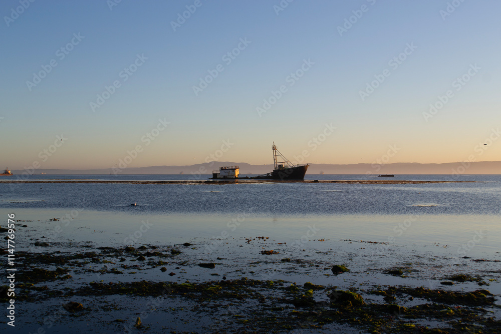 A ship stranded near a seawall on the coast of Chile A ship stranded near a seawall on the coast of Chile
