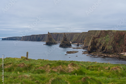 Duncansby Stacks rise from the North Sea near John o' Groats, Scotland photo