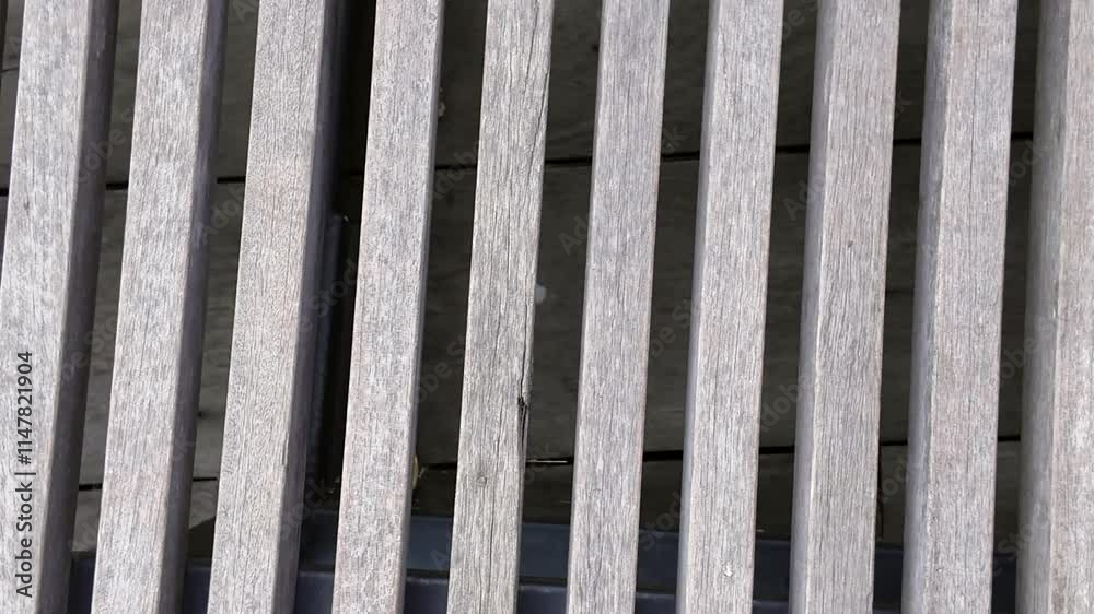 Wooden slat texture: A close-up of weathered wooden slats, showcasing the natural grain and texture. perfect for backgrounds, overlays, and design elements.