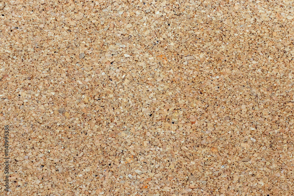 Blank background photo with sawdust floor in yellow wood frame. Cork board with wood chips Blank background photo with sawdust floor in yellow wood frame. Cork board with wood chips
