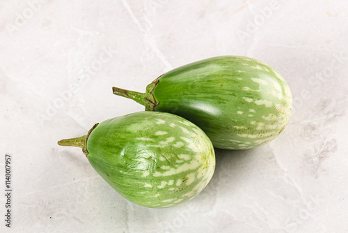 Ripe green mini eggplants heap photo