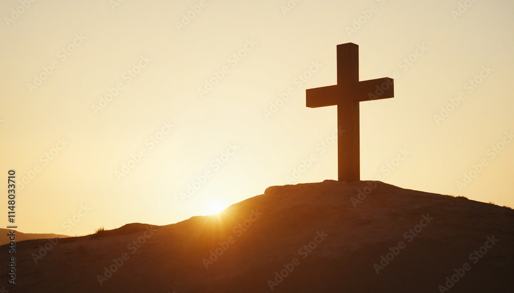 Silhouette of a cross in warm hues representing Christianity against a sunset with copy space Silhouette of a cross in warm hues representing Christianity against a sunset with copy space
