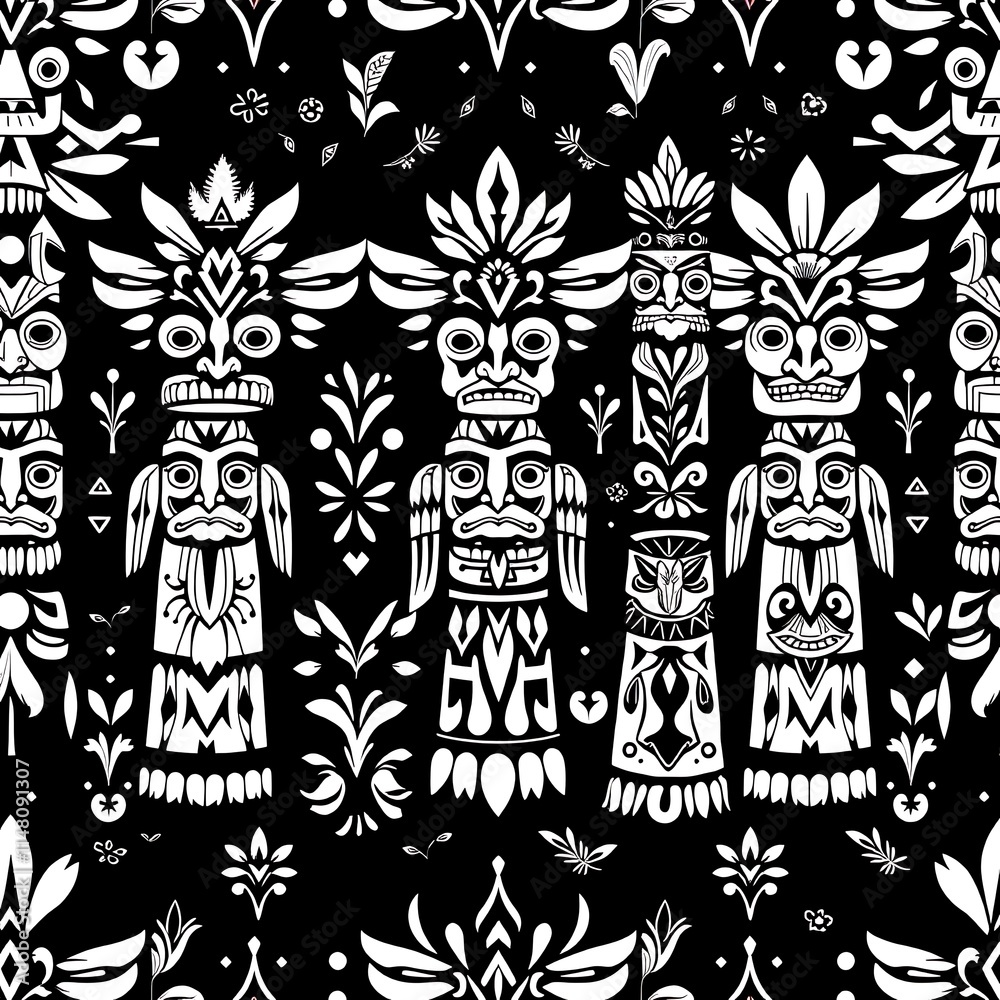 Fototapeta premium Black and White Totem Pole Pattern: A bold and graphic seamless pattern featuring intricate totem pole designs in white against a black backdrop.