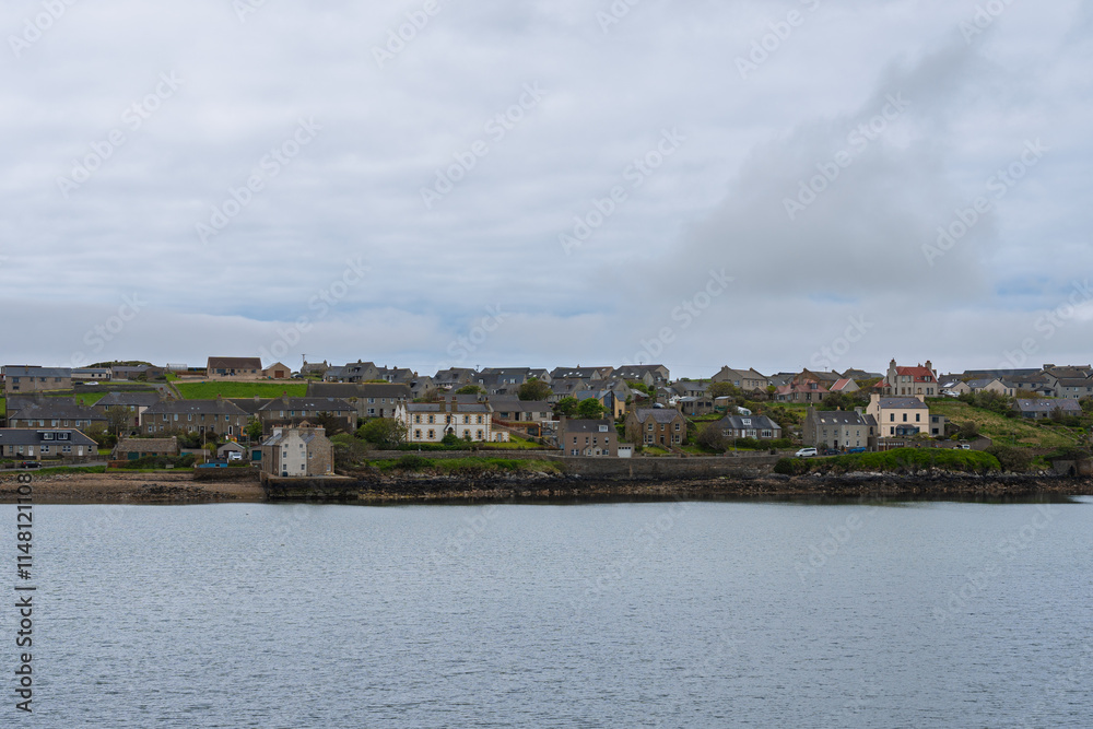 Scenic view of Stromness from the water on the Orkney Islands Scenic view of Stromness from the water on the Orkney Islands