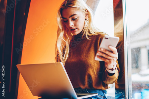 Shocked young woman stressed with software failure learning online course on netbook,stressed hipster girl wondering reading information about booking cancel on website disappointed with problems photo