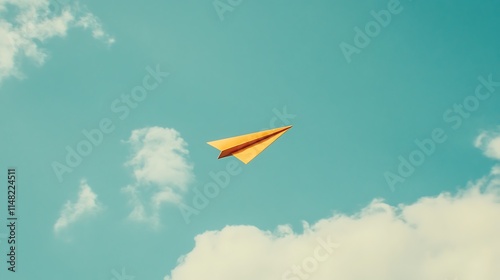 Paper airplane soaring sky.