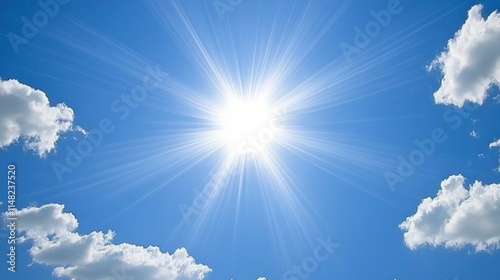 Bright sun shining in a clear blue sky with fluffy white clouds.