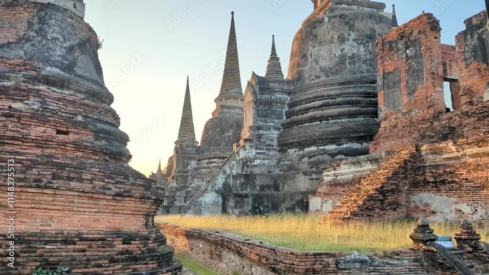 Sunset at Wat Phra Si Sanphet Temple, Ayutthaya, Thailand. The beautiful ancient,pointed chedi structures,standing on the site of the old Royal Palace, in Thailand's holiest  former capital.
