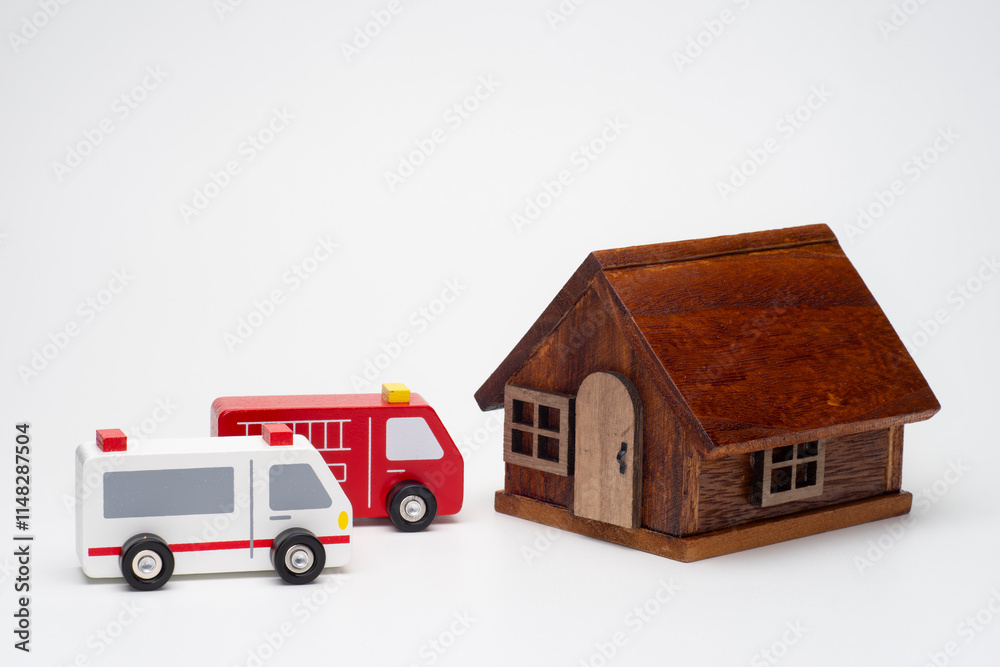 Fototapeta premium 住宅に駆け付けた消防車と救急車
