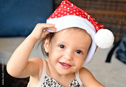 Toddler in Santa hat photo