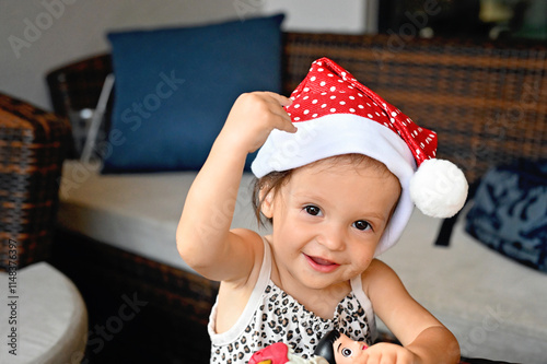 Toddler in Santa hat photo