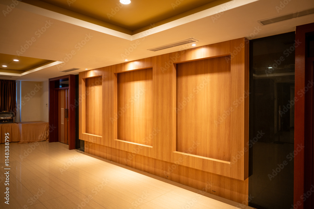 Luxurious hotel corridor interior featuring warm wood paneling, sophisticated lighting design, modern hospitality architecture. Luxurious hotel corridor interior featuring warm wood paneling, sophisticated lighting design, modern hospitality architecture.