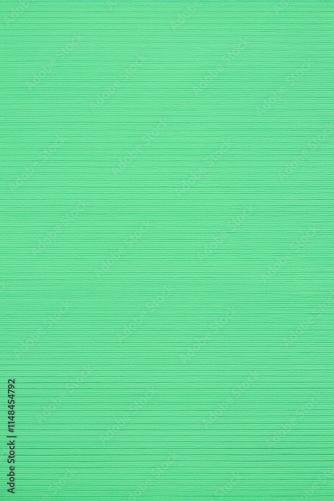 a close up of a green background with a single red object a close up of a green background with a single red object