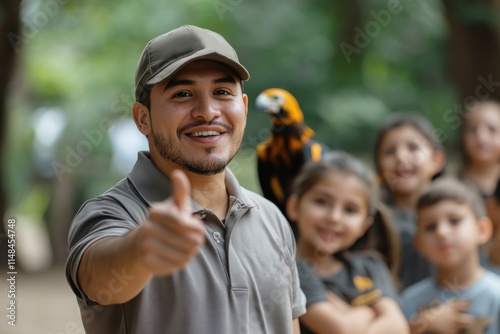 A cheerful guide poses with children and a colorful parrot, showcasing a joyful interaction and connection with nature in a playful and engaging outdoor environment. photo