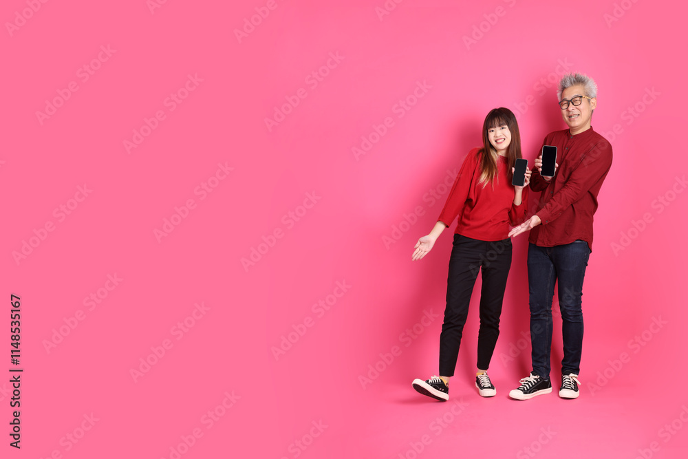 man and woman in red clothes man and woman in red clothes