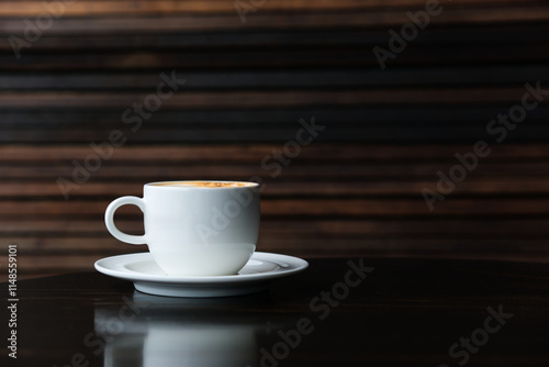 Hot coffee placed on the table, clear photo with blurred background