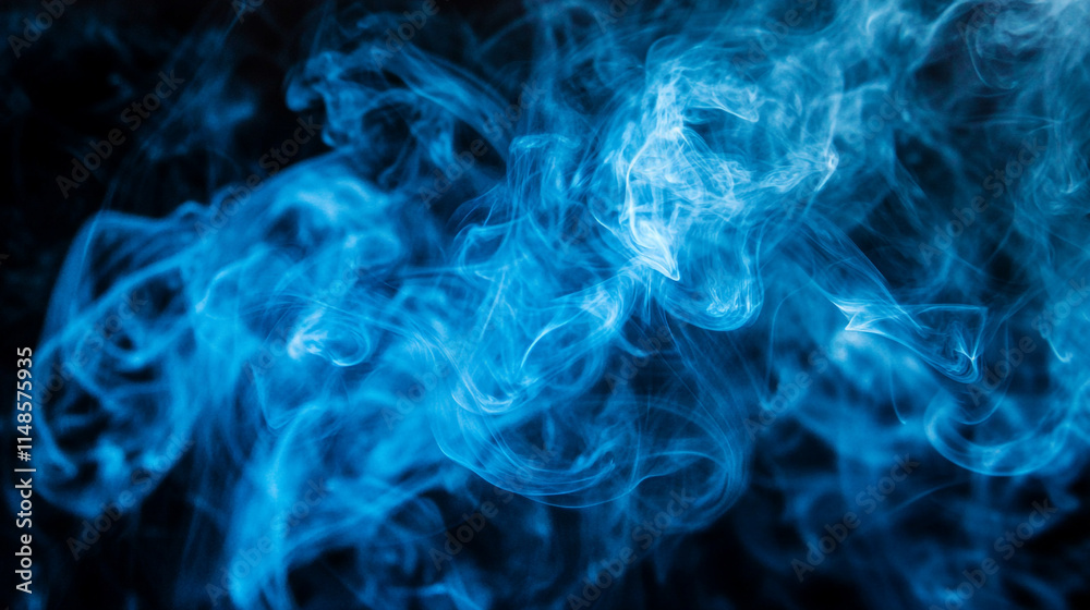 Ethereal blue smoke swirling against a dark background in mesmerizing patterns. Ethereal blue smoke swirling against a dark background in mesmerizing patterns.