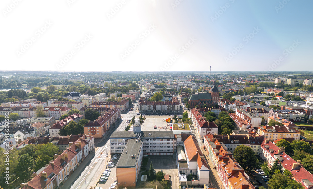 Summer skyline cityscape of Koszalin, West Pomerania (Zachodniopomorskie), Poland. Wide aerial panorama of Old Town square (Koszaliński Rynek Staromiejski) with Town Hall (Ratusz) and Cathedral