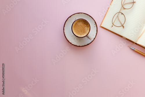 workplace with coffee cup, glasses. black coffee, espresso on the table. flatlay. coffee break.pastel background 