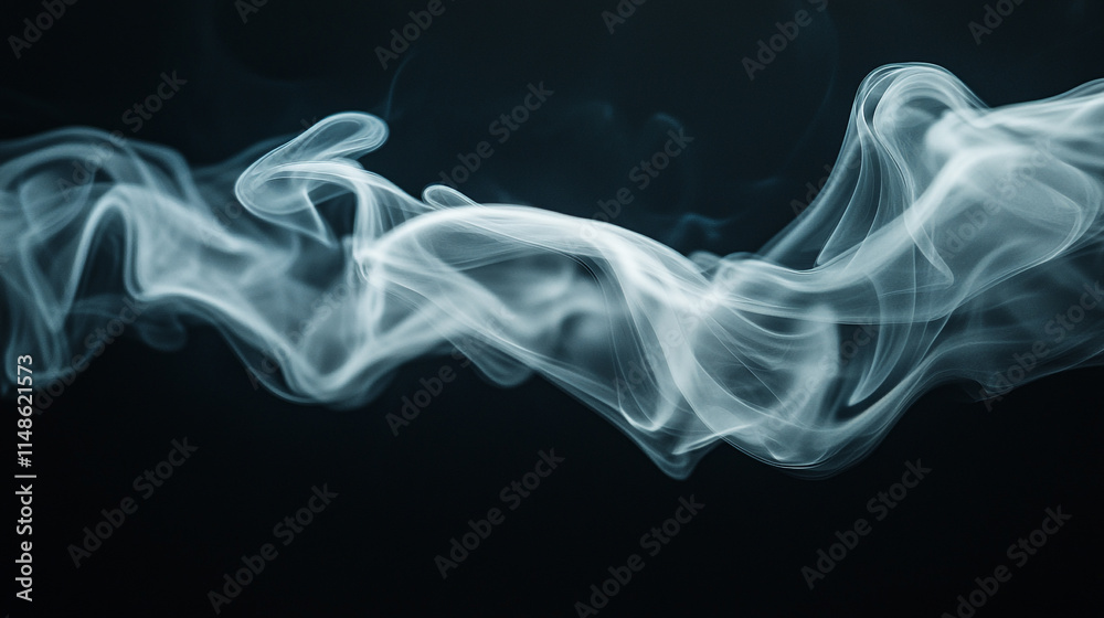 Wisps of smoke danceracefully in a dark space creating an ethereal effect. Wisps of smoke danceracefully in a dark space creating an ethereal effect.