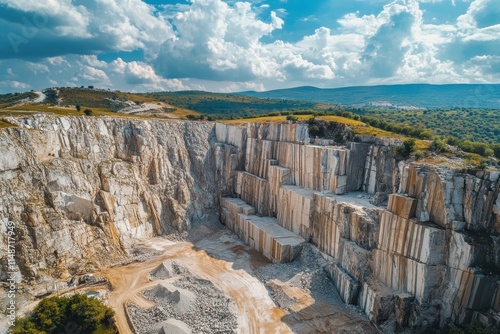 Aerial view of a marble quarry and stone blocks under a cloudy blue sky in Karamanli Burdur Turkey photo