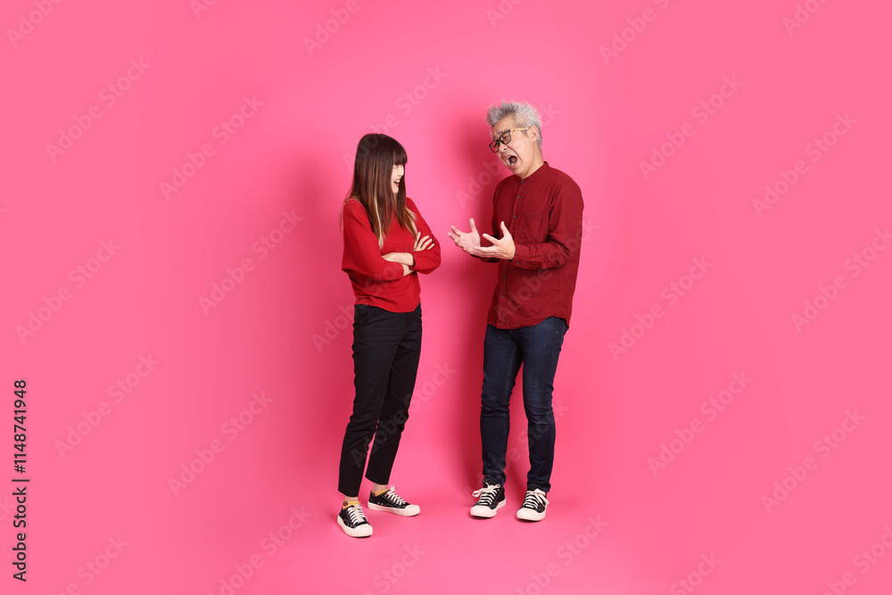 man and woman in red clothes man and woman in red clothes
