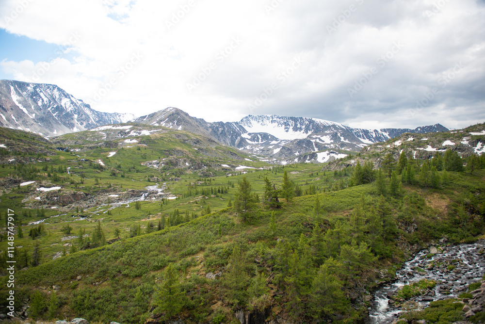 Fototapeta premium Aerial view of majestic altai mountains with snow and clouds, Altai Tavan Bogd, Mongolia