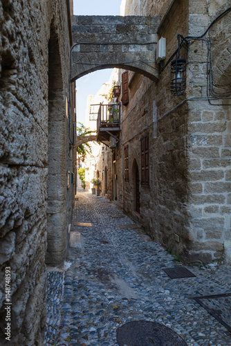 Fototapeta Naklejka Na Ścianę i Meble -  Beautiful streets and buildings of the old town of Rhodes in Greece