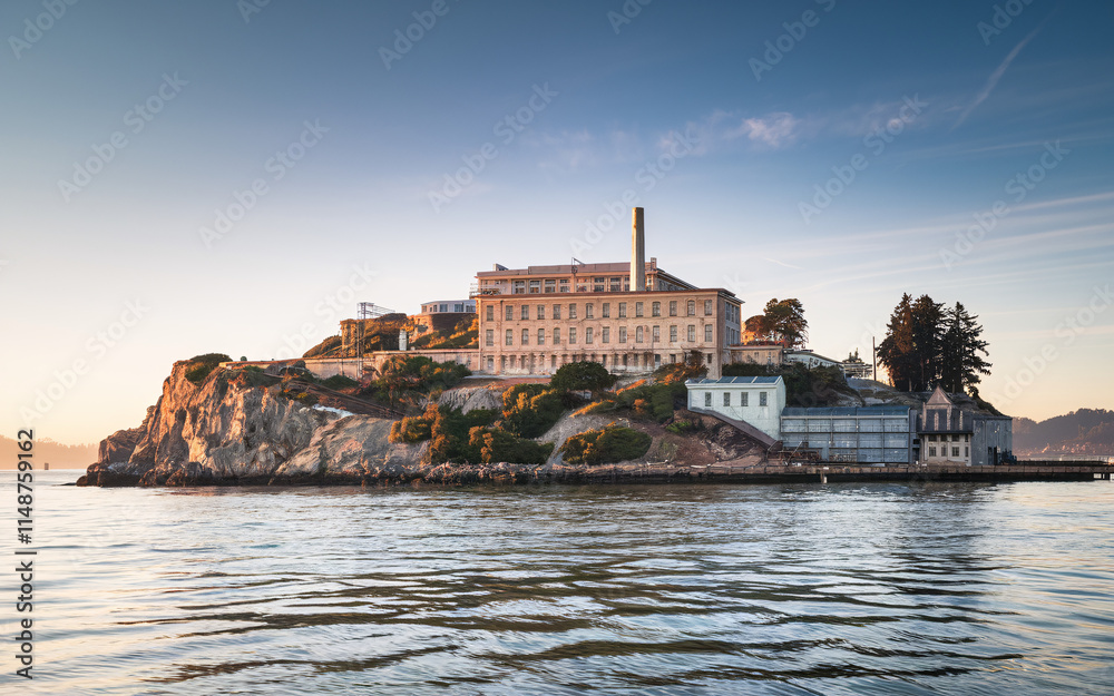 Alcatraz Island at sunset, showcasing the infamous prison and surrounding waters. Alcatraz Island at sunset, showcasing the infamous prison and surrounding waters.