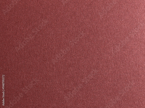 Burgundy red metallic paper texture with a glossy satin finish and subtle gradient. The warm red-brown tones and shimmering surface create a rich and elegant design, perfect for photo