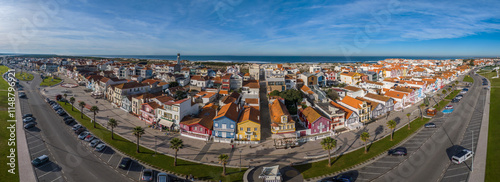 Panoramic aerial view of colourful houses along Costa Nova do Prado beach, Portugal